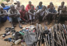 The Edo State Security Corps (ESSC) Arrests 18 Suspected Kidnappers Along  Benin- Auchi Road and Recovers 38 Guns